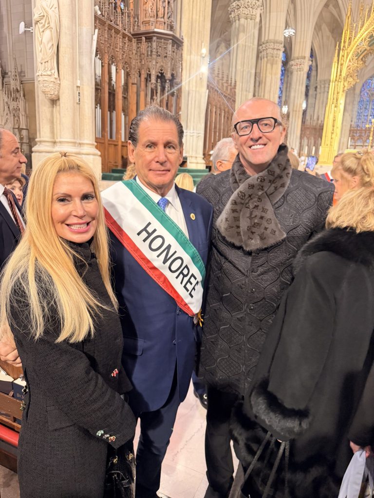 Denise Rizzuto, Ambassador Leandro Rizzuto wearing a green-white-red honoree sash, and Prince Mario-Max Schaumburg-Lippe inside St. Patrick's Cathedral in New York